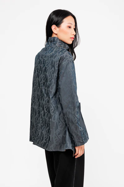 CHAQUETA REVERSIBLE NEGRA Y BEIGE - Anekke