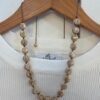 Collar Corto de Cuentas de Cerámica en Tonos Tierra y Beige